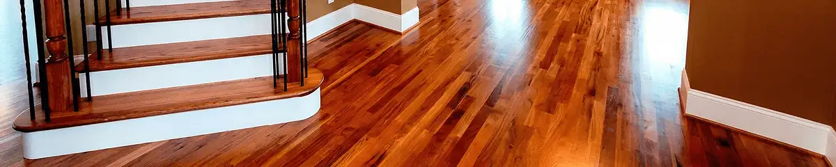 Base floor of a staircase with professionally restored wood flooring in Memphis TN