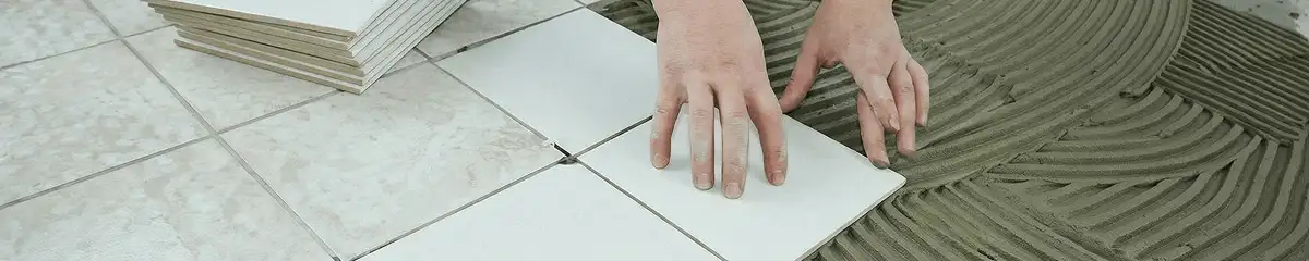 Professional installing white tile floors in Memphis, TN