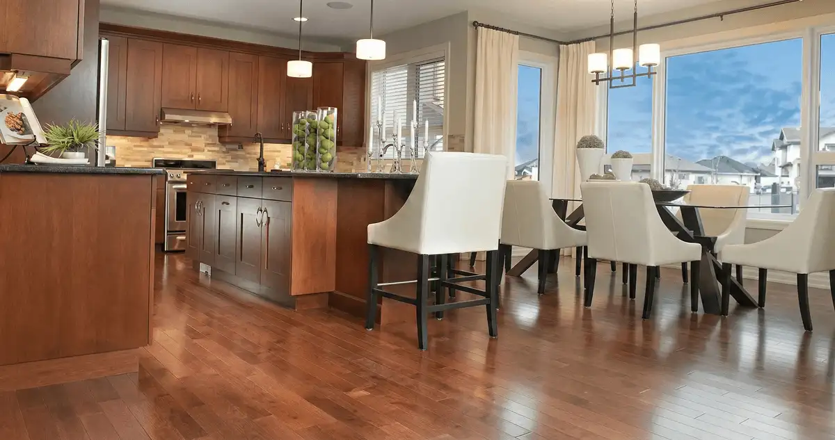 A modern kitchen with professionally installed wood flooring in Memphis, TN